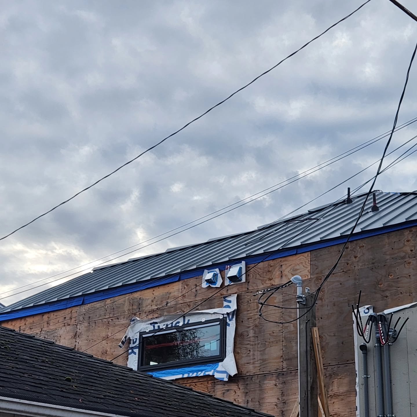 Custom sheet metal flashing detail for Harrison BC home